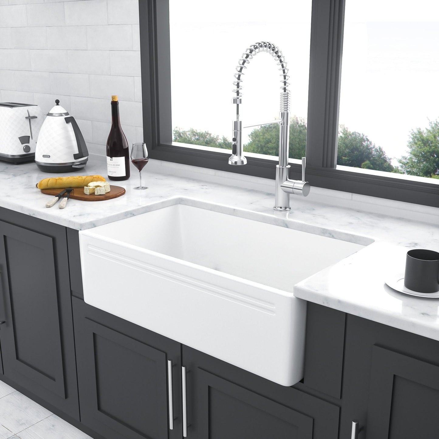 Undermount ceramic kitchen sink with chrome spring faucet on marble countertop with cabinets on Tampa Home & Garden Store