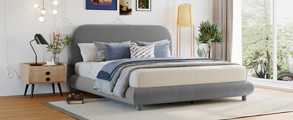 Upholstered platform bed in gray fabric with thick curved frame and headboard by HouseOfZazla on Tampa Home & Garden Store
