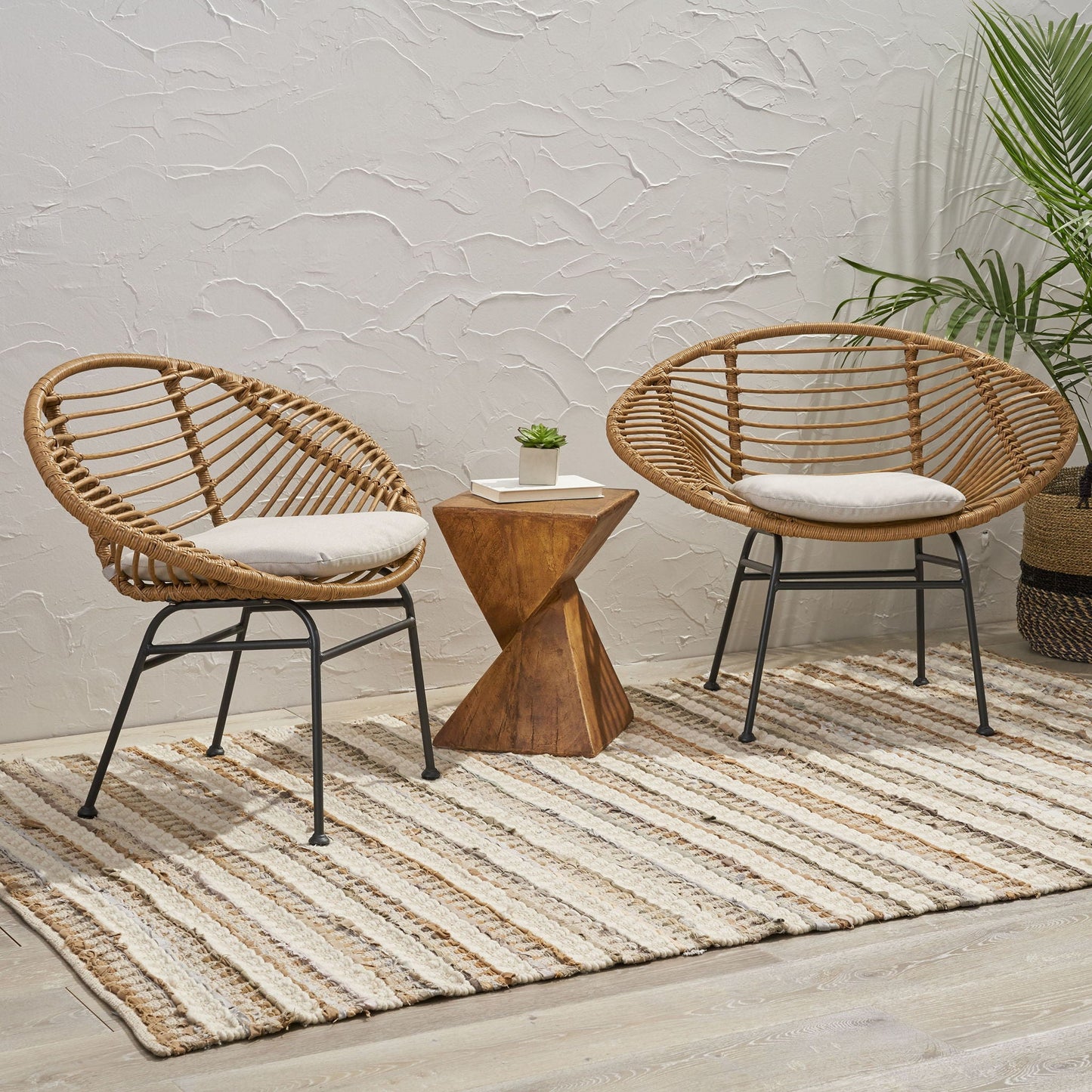 Cordella Wicker Chairs Set of 2, natural wicker with cushioned seats and black metal legs on Tampa Home & Garden Store