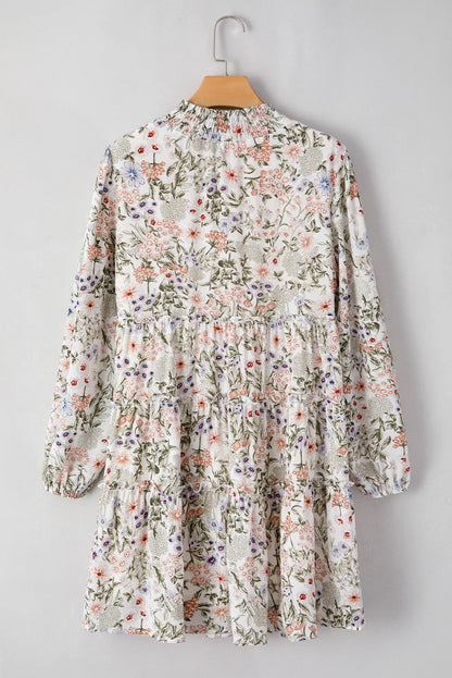 Floral printed mock-neck long sleeve mini dress by Stevvex with tiered skirt in white on Tampa Home & Garden Store