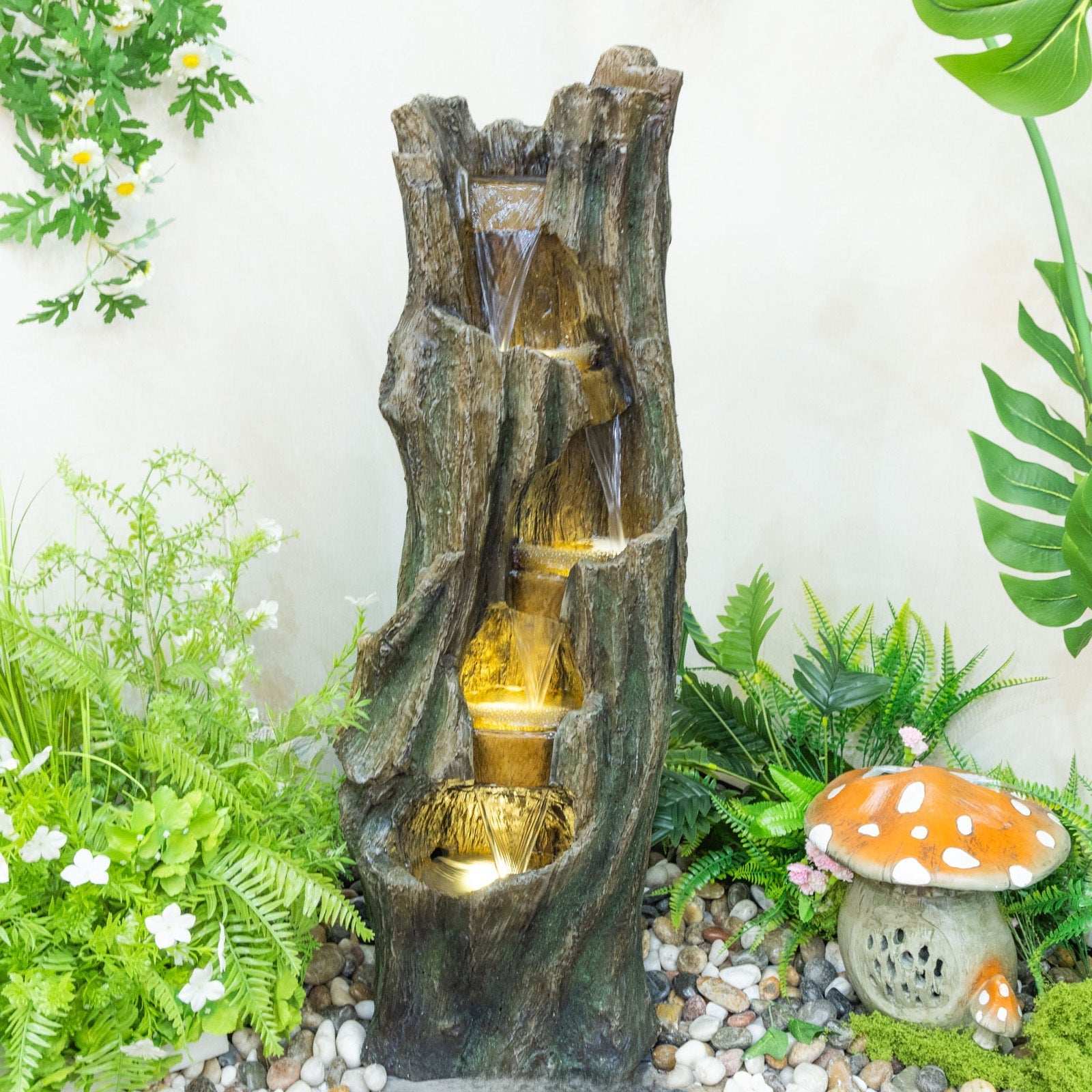 Waterfall Fountain in faux rock with cascading water for outdoor gardens and patios on Tampa Home & Garden Store