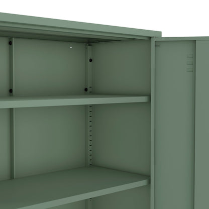 Accent cabinet with adjustable shelves in green steel finish on Tampa Home & Garden Store
