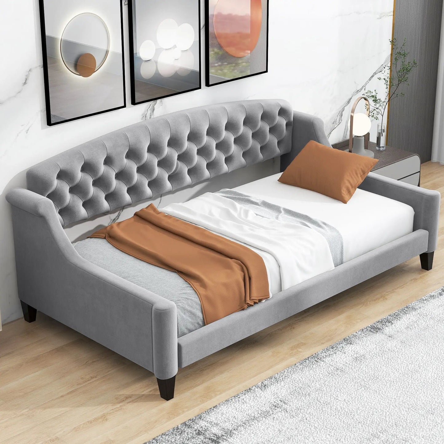 Modern Tufted Button Daybed in gray fabric by Unique Piece Furniture with orange pillows on Tampa Home & Garden Store