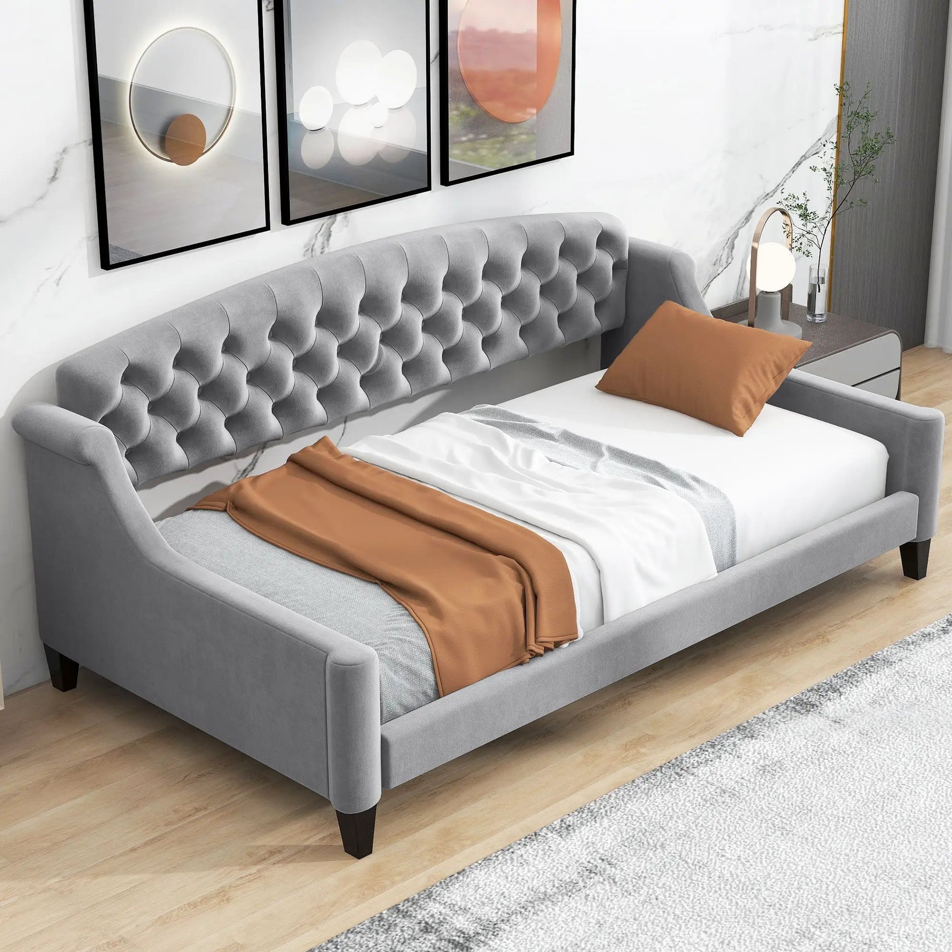 Modern Tufted Button Daybed in gray fabric by Unique Piece Furniture with orange pillows on Tampa Home & Garden Store
