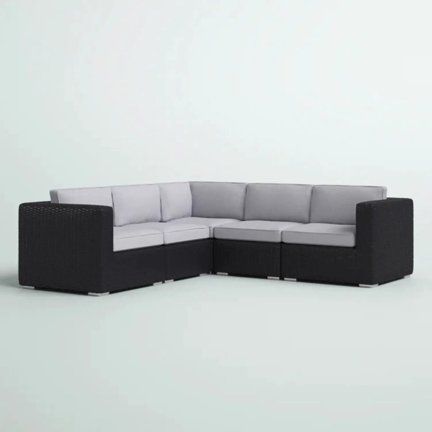 Luxurious Wicker Patio Sectional with Sunbrella cushions, black woven frame, light gray cushions on Tampa Home & Garden Store