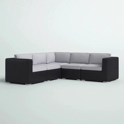 Luxurious Wicker Patio Sectional with Sunbrella cushions, black woven frame, light gray cushions on Tampa Home & Garden Store