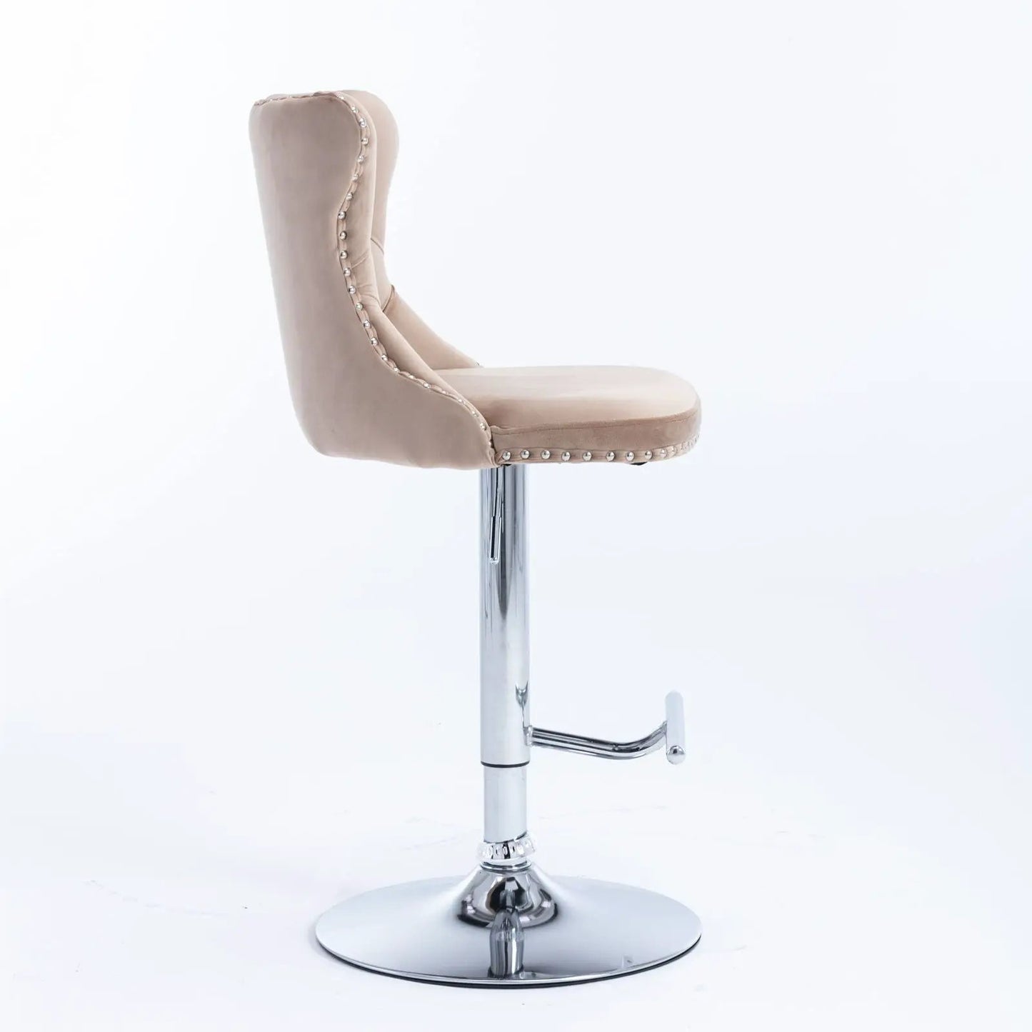 Beige tufted swivel bar stool with nailhead trim and chrome pedestal base on Tampa Home & Garden Store