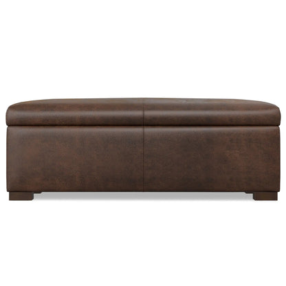 Gabbie storage ottoman coffee table in brown leather with centered top seam and block feet on Tampa Home & Garden Store