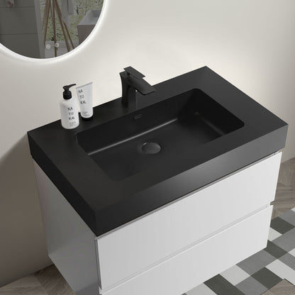 Modern floating vanity with black countertop, white base, matte black faucet, backlit mirror on Tampa Home & Garden Store