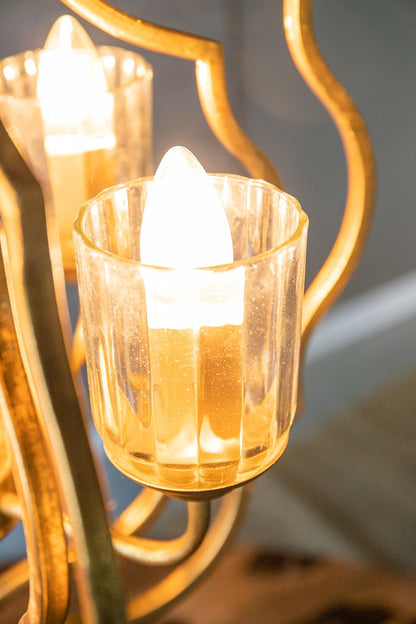 4 Light Metal Chandelier with gold finish and ribbed glass shades, bulbs not included on Tampa Home & Garden Store
