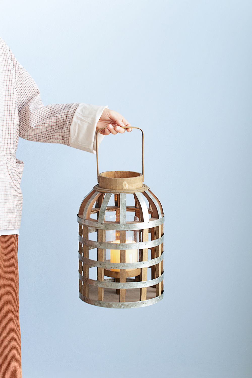 Decorative wooden lantern by HouseOfZazla with metal bands and curved handle, candle inside on Tampa Home & Garden Store