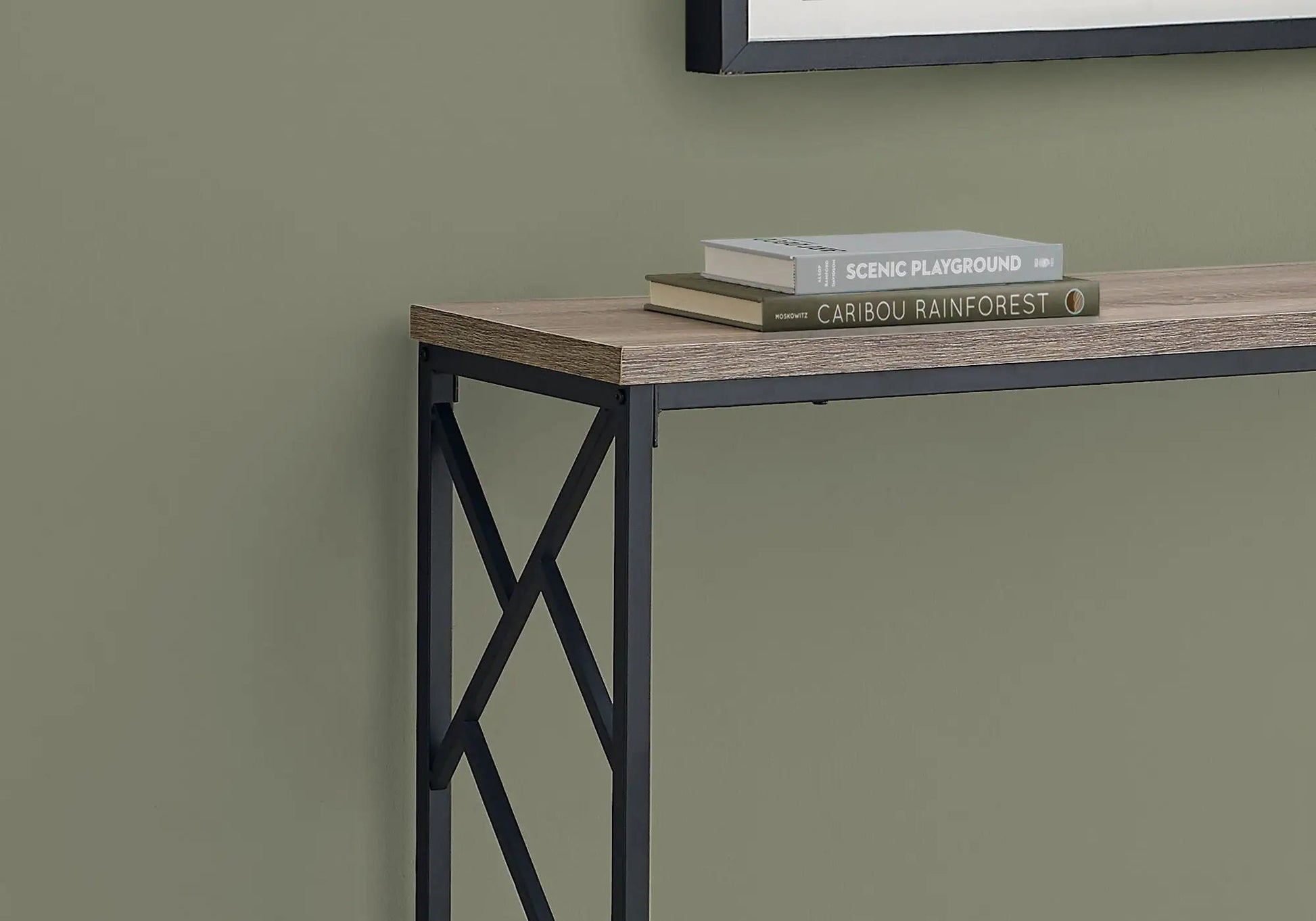 Accent console table with natural wood top and black metal X-frame two books stacked on Tampa Home & Garden Store