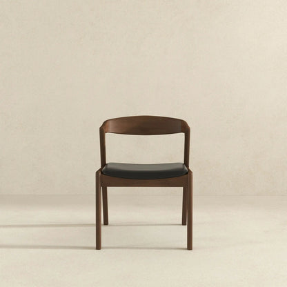Dakota mid-century dining chair by Unique Piece Furniture; brown wood frame with black seat on Tampa Home & Garden Store