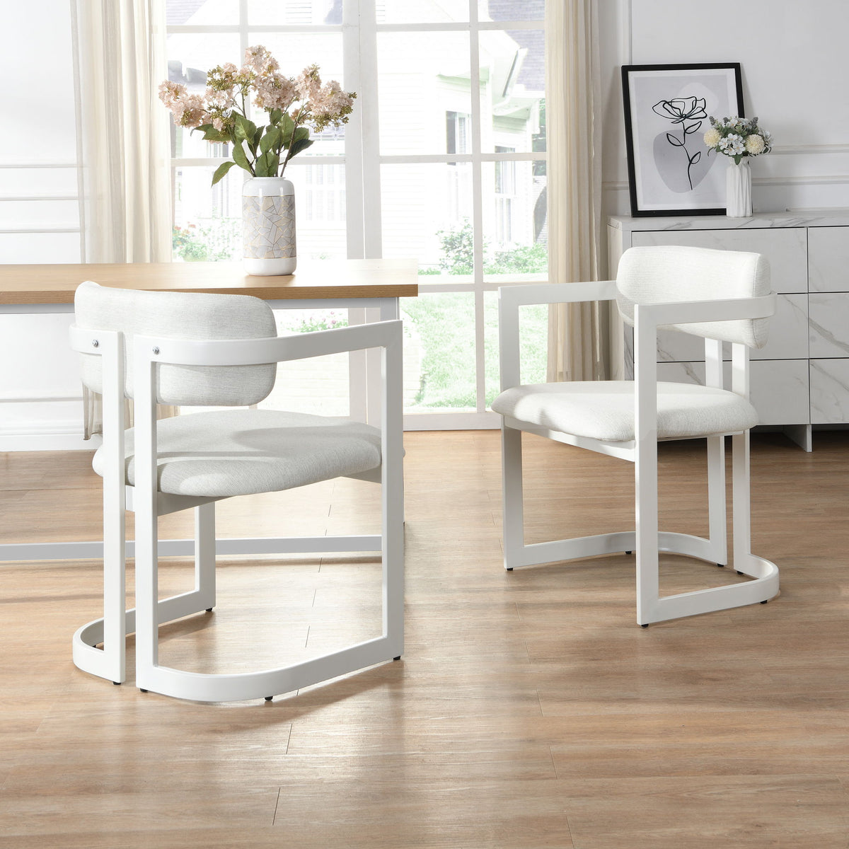 Upholstered dining armchairs set of 2 in white fabric with soft gray cushions on Tampa Home & Garden Store