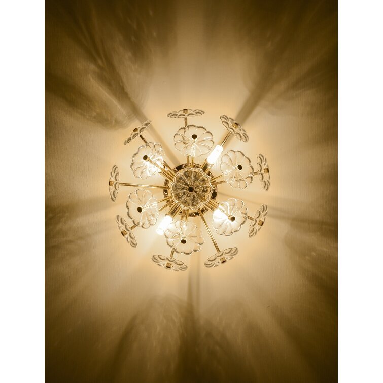 Gold flush mount ceiling light with crystal flower petals in a starburst pattern on Tampa Home & Garden Store