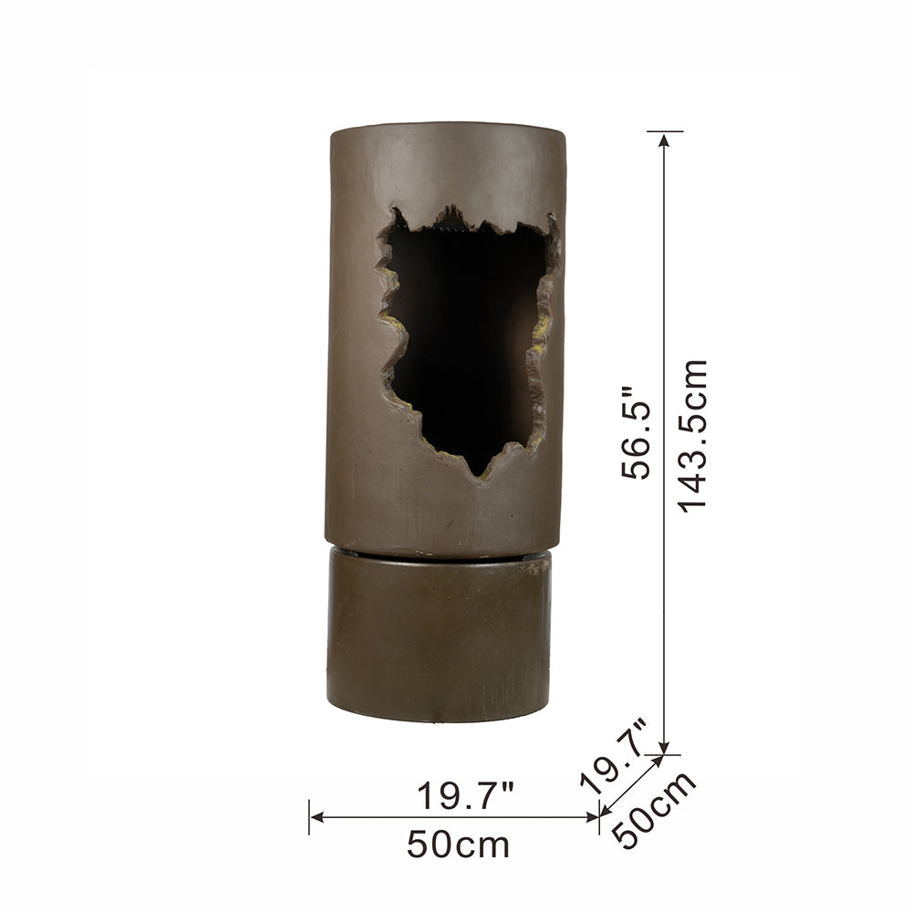 Large outdoor water fountain with light, bronze-brown cylindrical pillar with jagged cutout on Tampa Home & Garden Store