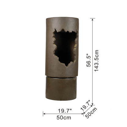 Large outdoor water fountain with light, bronze-brown cylindrical pillar with jagged cutout on Tampa Home & Garden Store