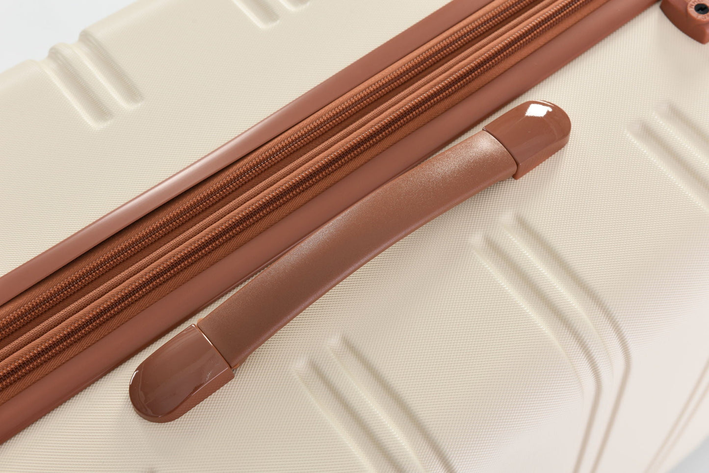 Hardshell luggage set 2-piece copper rose-gold zippers on beige shell HouseOfZazla on Tampa Home & Garden Store