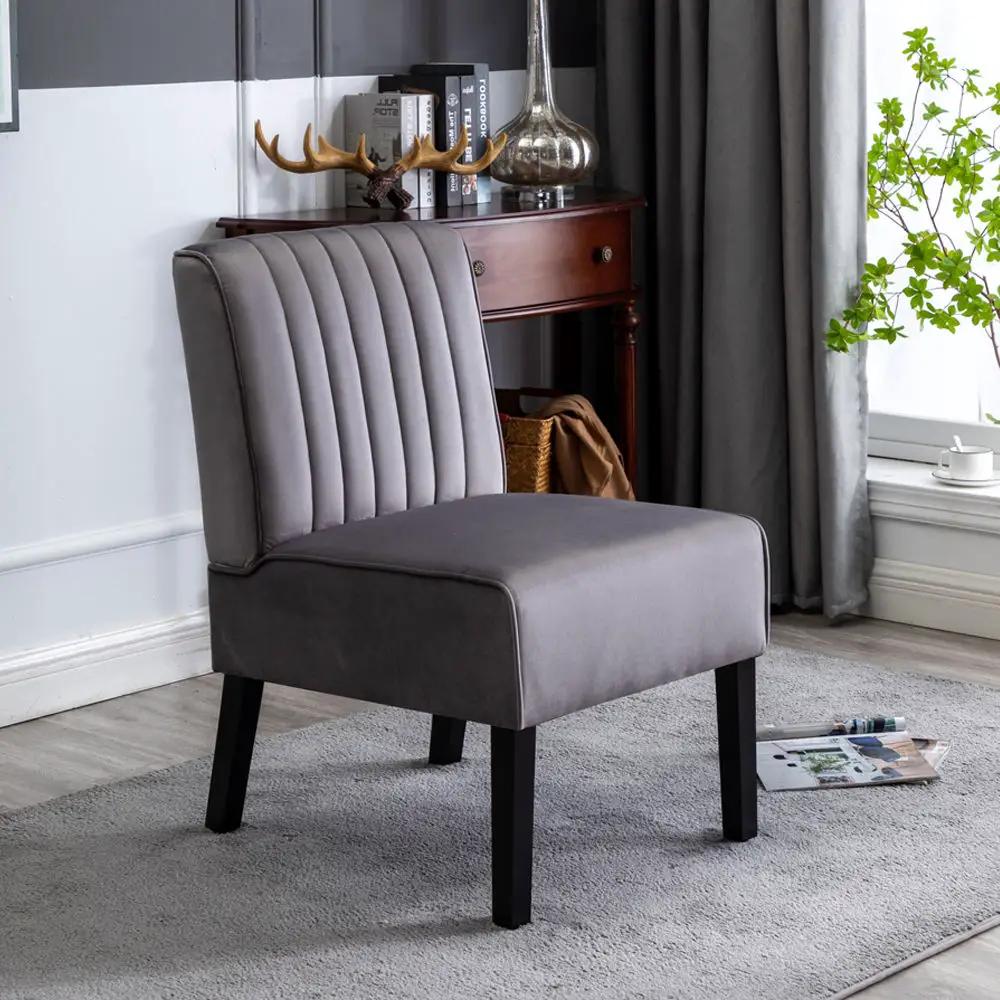 Reese mid-century modern accent chair in grey upholstery with black legs on Tampa Home & Garden Store