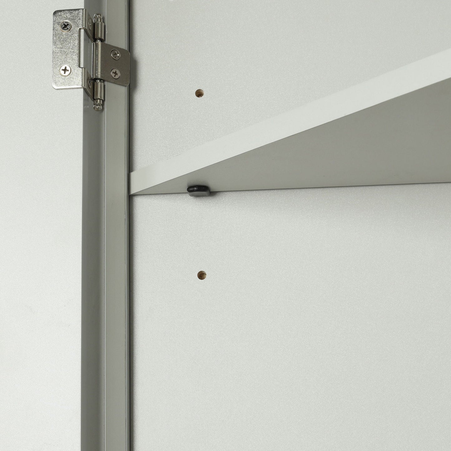 Triangle bathroom storage cabinet hinge close-up on gray interior panel with screws on Tampa Home & Garden Store