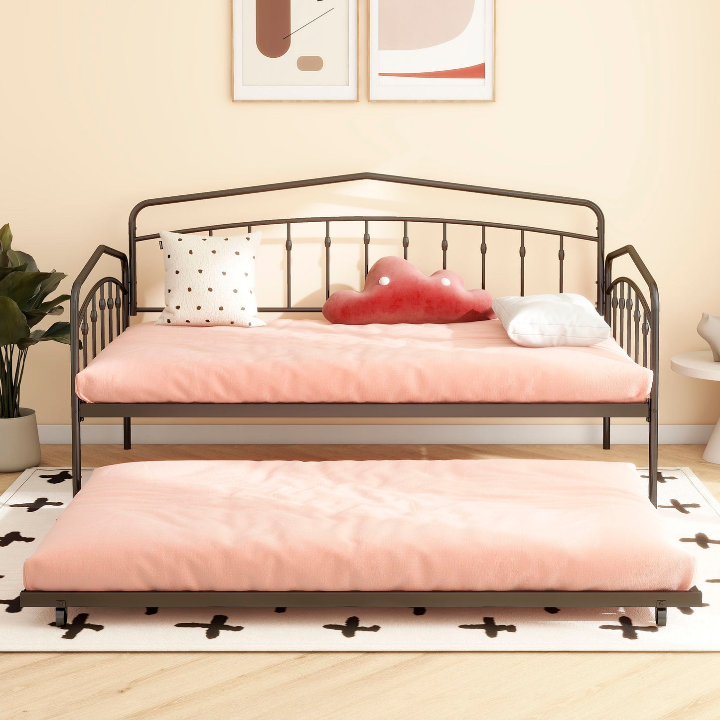 Fox Daybed with Twin Trundle in pink bedding, dark metal frame, includes dotted throw pillow on Tampa Home & Garden Store