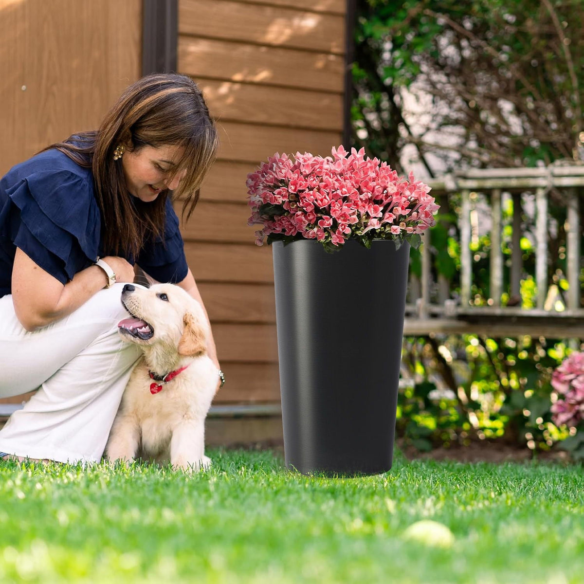 Planter For Outdoor, matte black planter with pink hydrangeas beside a woman and her dog on Tampa Home & Garden Store