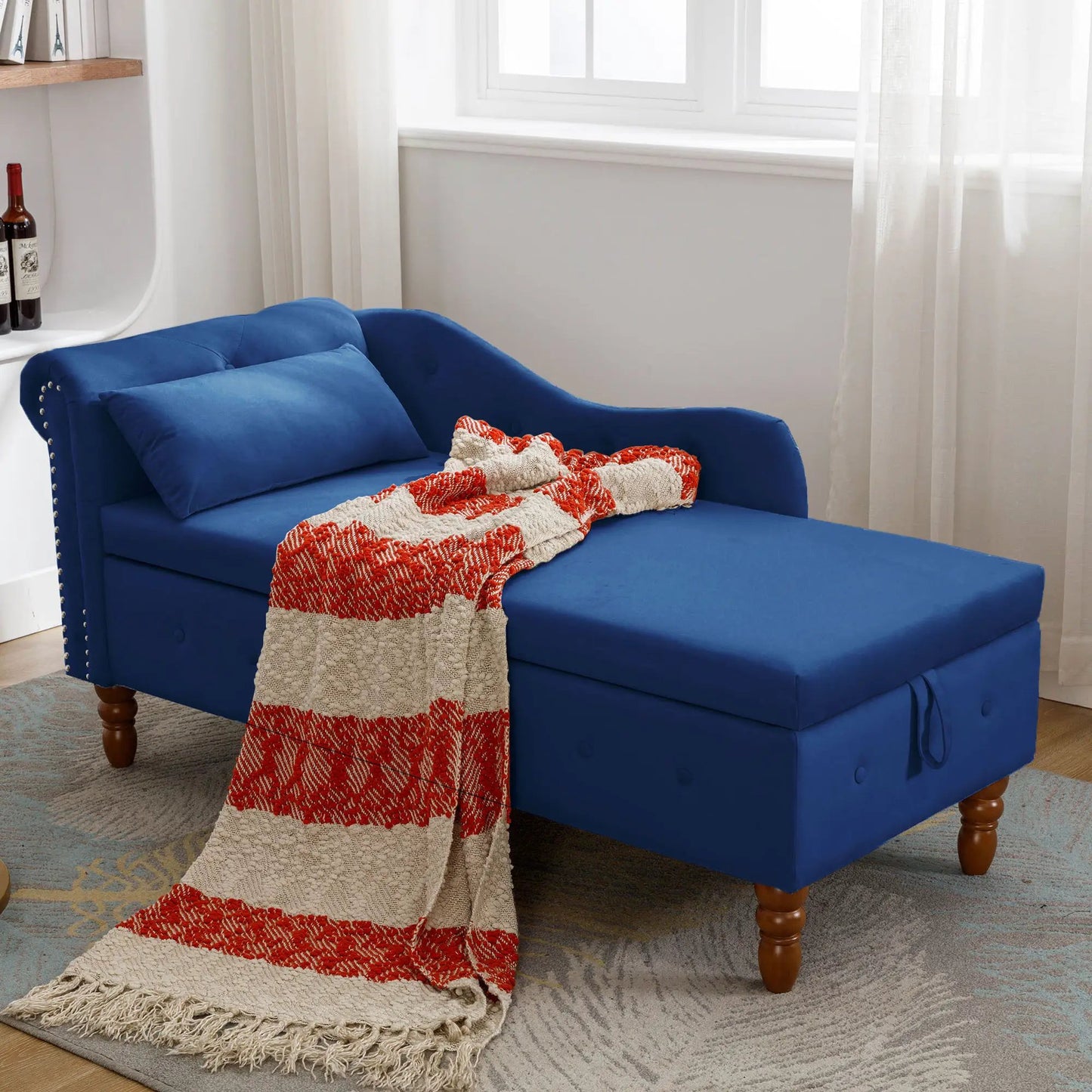 Blue upholstered chaise lounge with rolled arms, nailhead trim, and two cushions on Tampa Home & Garden Store