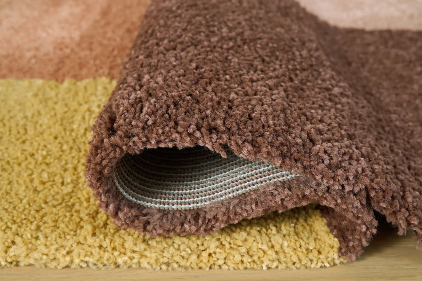 Gailmore rug with brown shaggy pile, Unique Piece Furniture area rug on Tampa Home & Garden Store