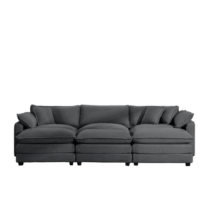 Modern oversized modular sofa with ottoman in dark fabric, deep seating and tufted cushions on Tampa Home & Garden Store