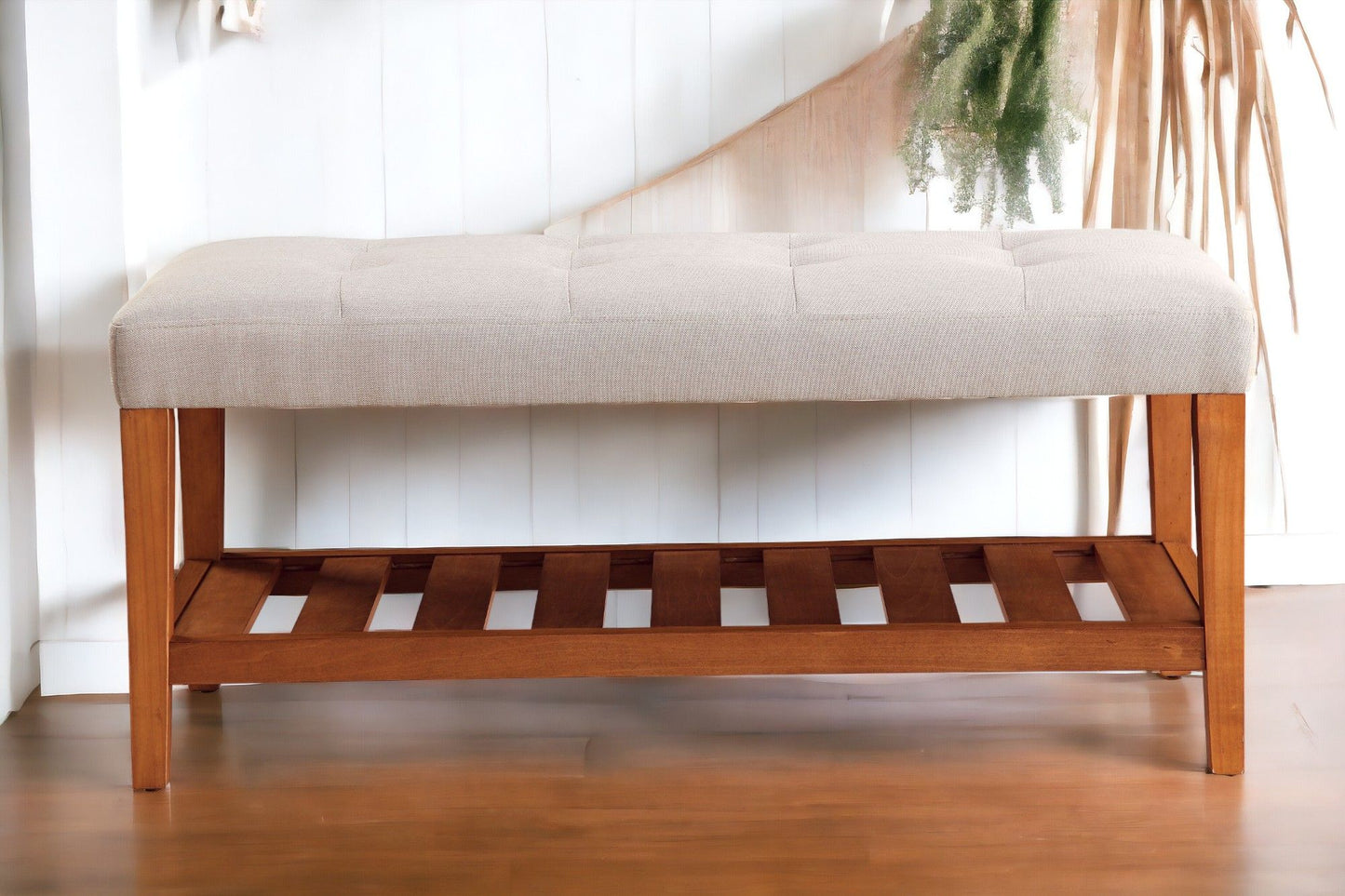 Charla Upholstered Bench in light beige fabric with tufted seat and natural wood legs on Tampa Home & Garden Store
