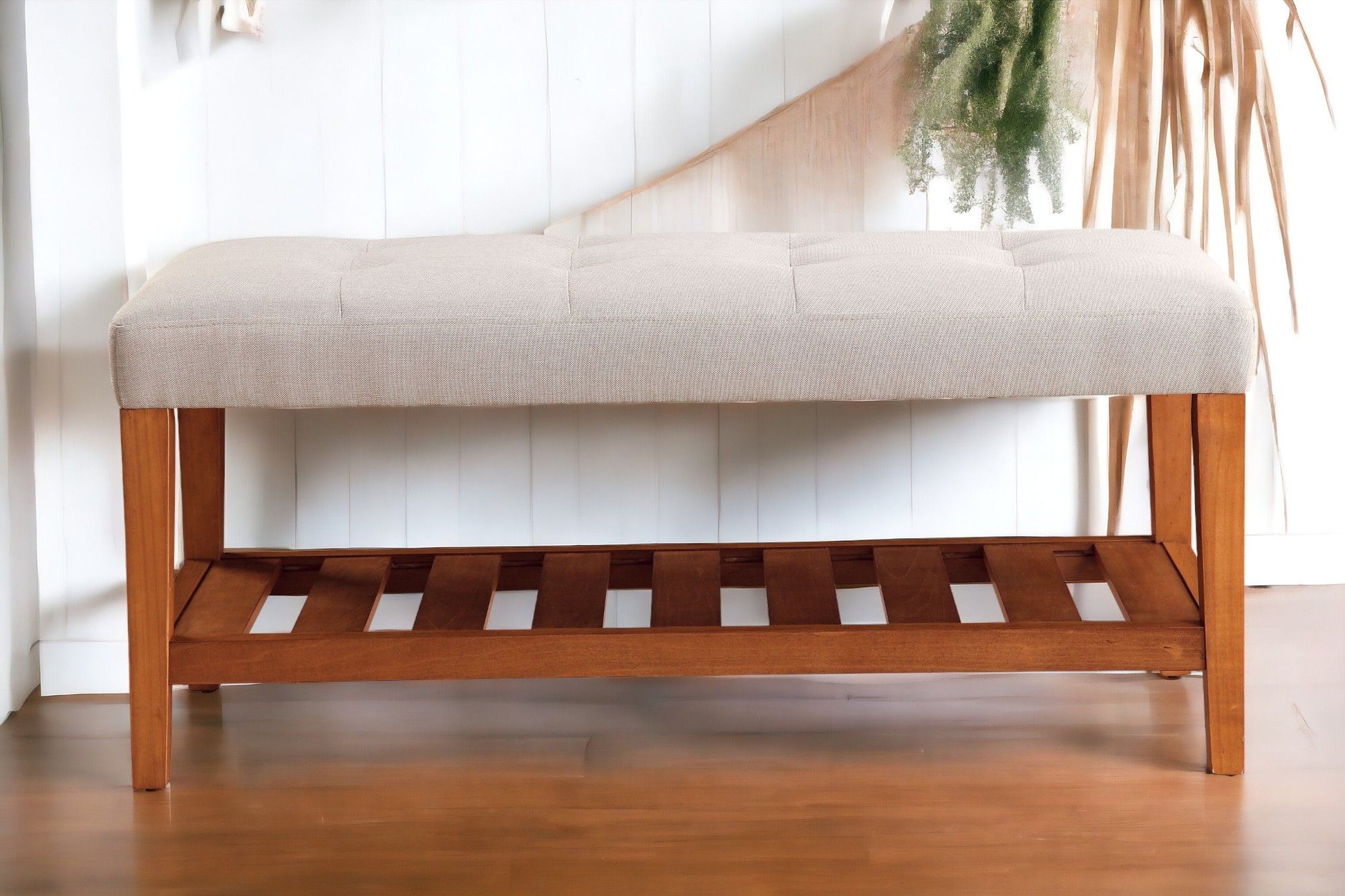 Charla Upholstered Bench in light beige fabric with tufted seat and natural wood legs on Tampa Home & Garden Store