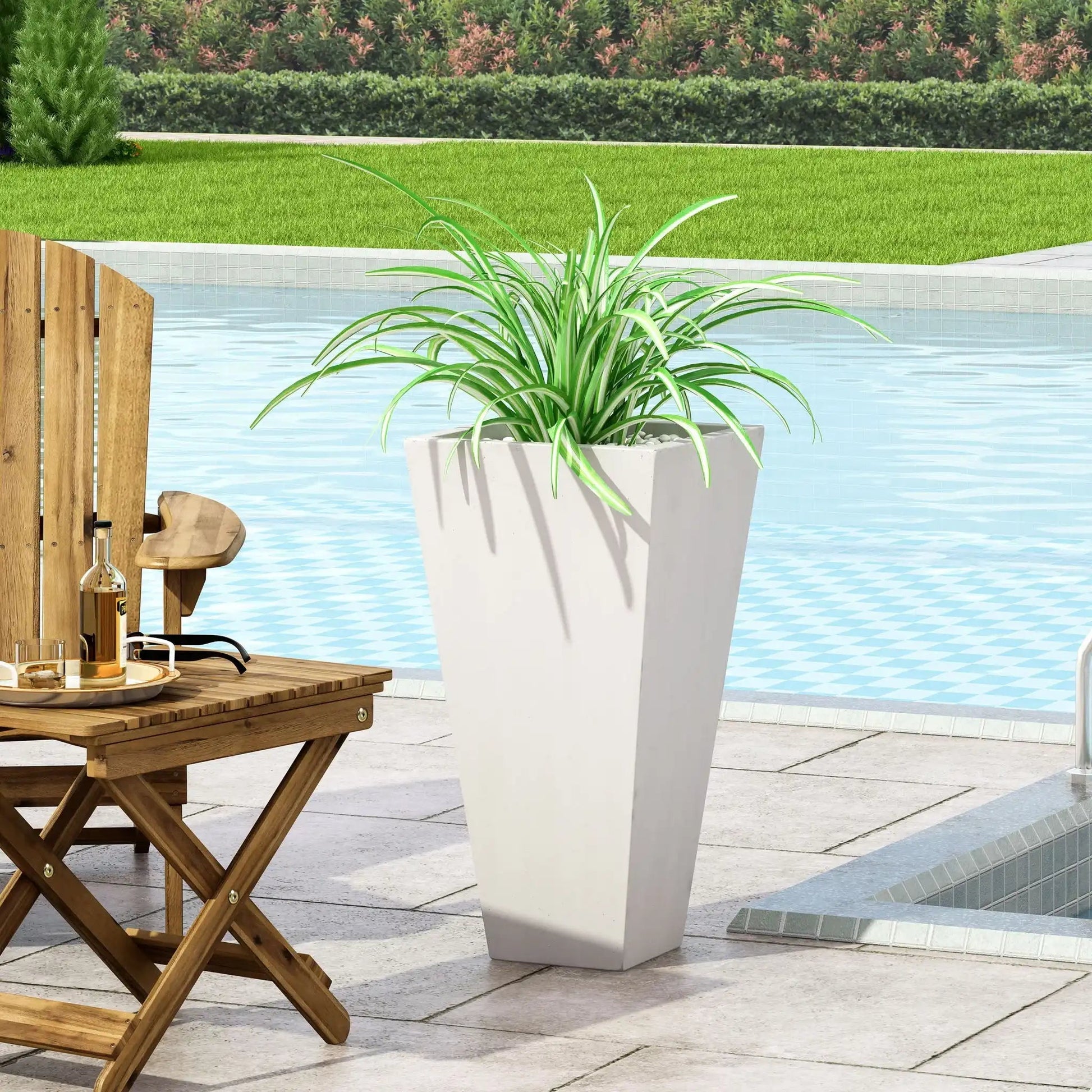 Outdoor Modern Cast Stone Planter in white with angular silhouette and lush green plant on Tampa Home & Garden Store