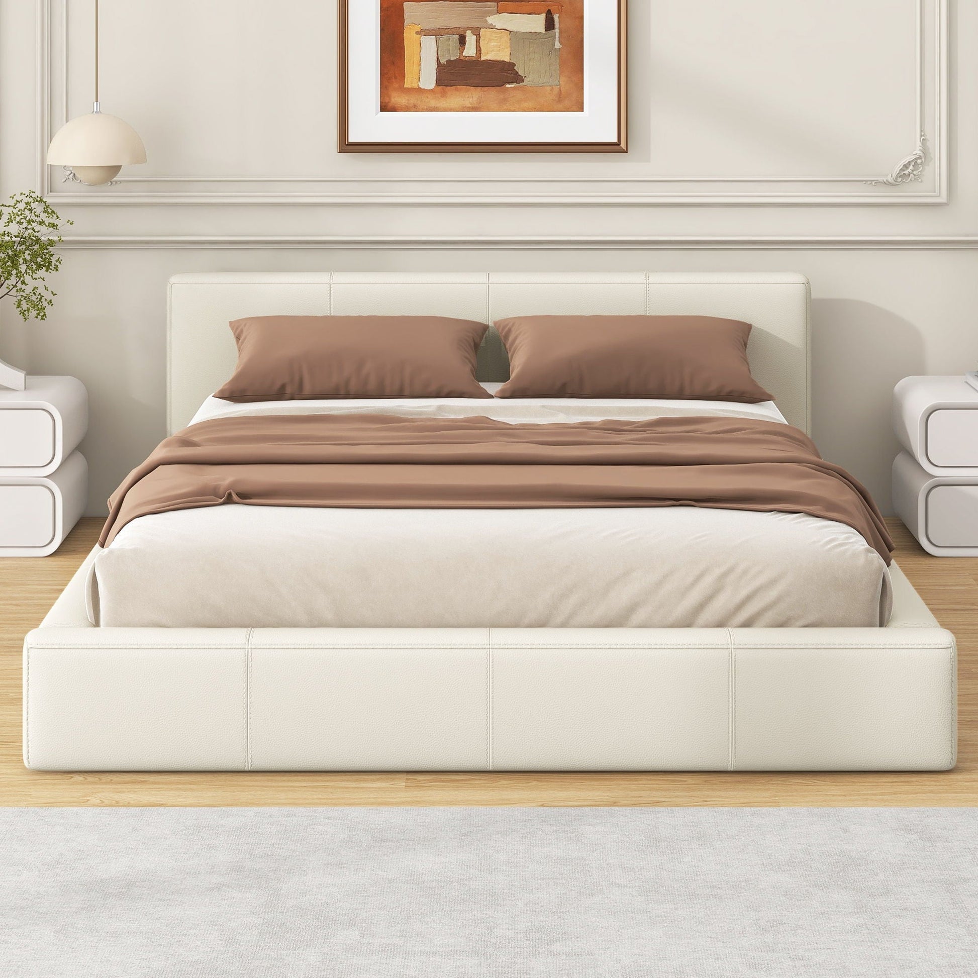 Stylish upholstered bed with birch wood frame in cream fabric, taupe bedding on Tampa Home & Garden Store