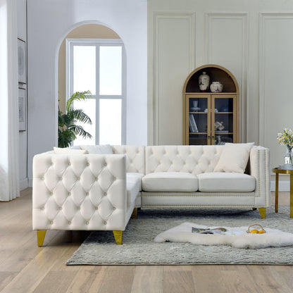 White tufted L-shaped corner sofa, 5-seat stationary sectional in a modern living room on Tampa Home & Garden Store