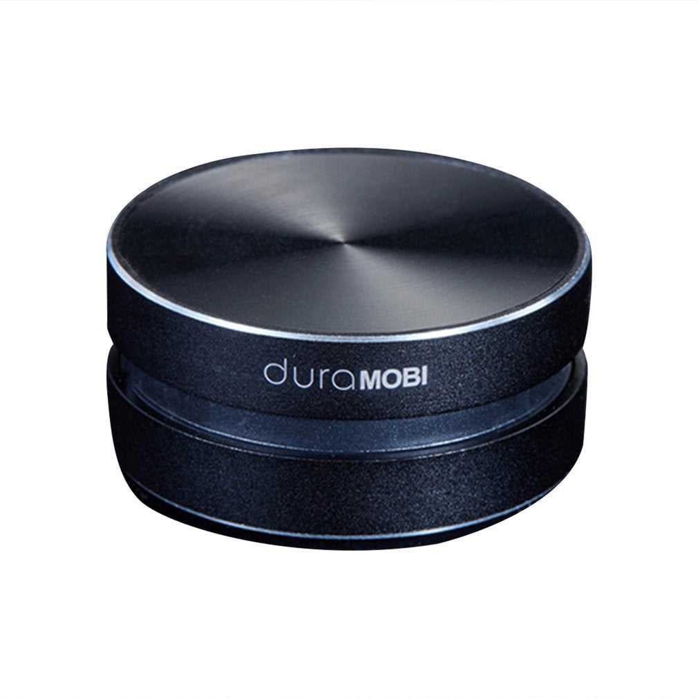 Bone conduction speaker DuraMOBI, compact circular black Bluetooth wireless speaker on Tampa Home & Garden Store