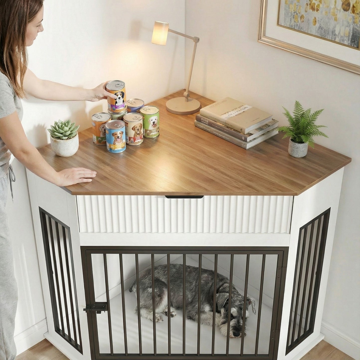 Corner Dog Crate built into a white cabinet with black metal bars; two dogs inside on Tampa Home & Garden Store