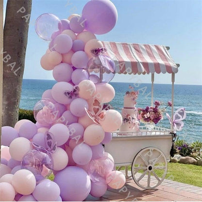 Purple pink luxury balloons set for birthday decor, Stevvex arch beside seaside cart on Tampa Home & Garden Store