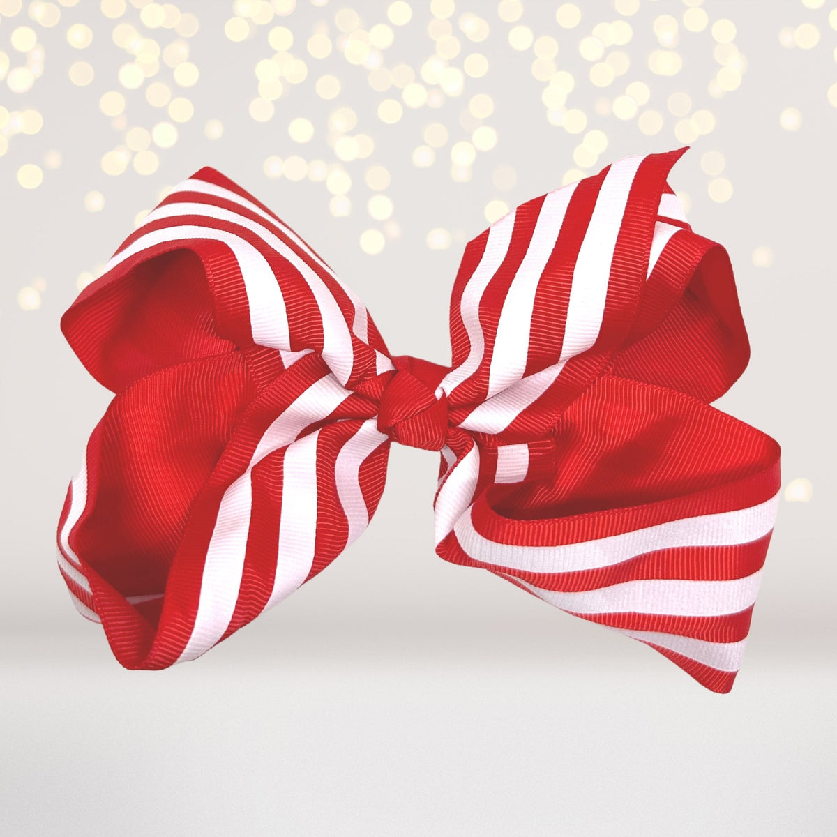 Hair bow oversized red and white stripe grosgrain clip on Tampa Home & Garden Store
