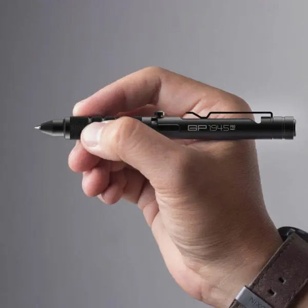 Bolt Action Pen LITE GP 1945 by GPCA in black metal with clip held in hand on Tampa Home & Garden Store