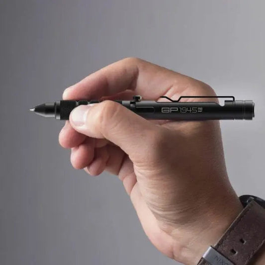 Bolt Action Pen LITE GP 1945 by GPCA in black metal with clip held in hand on Tampa Home & Garden Store