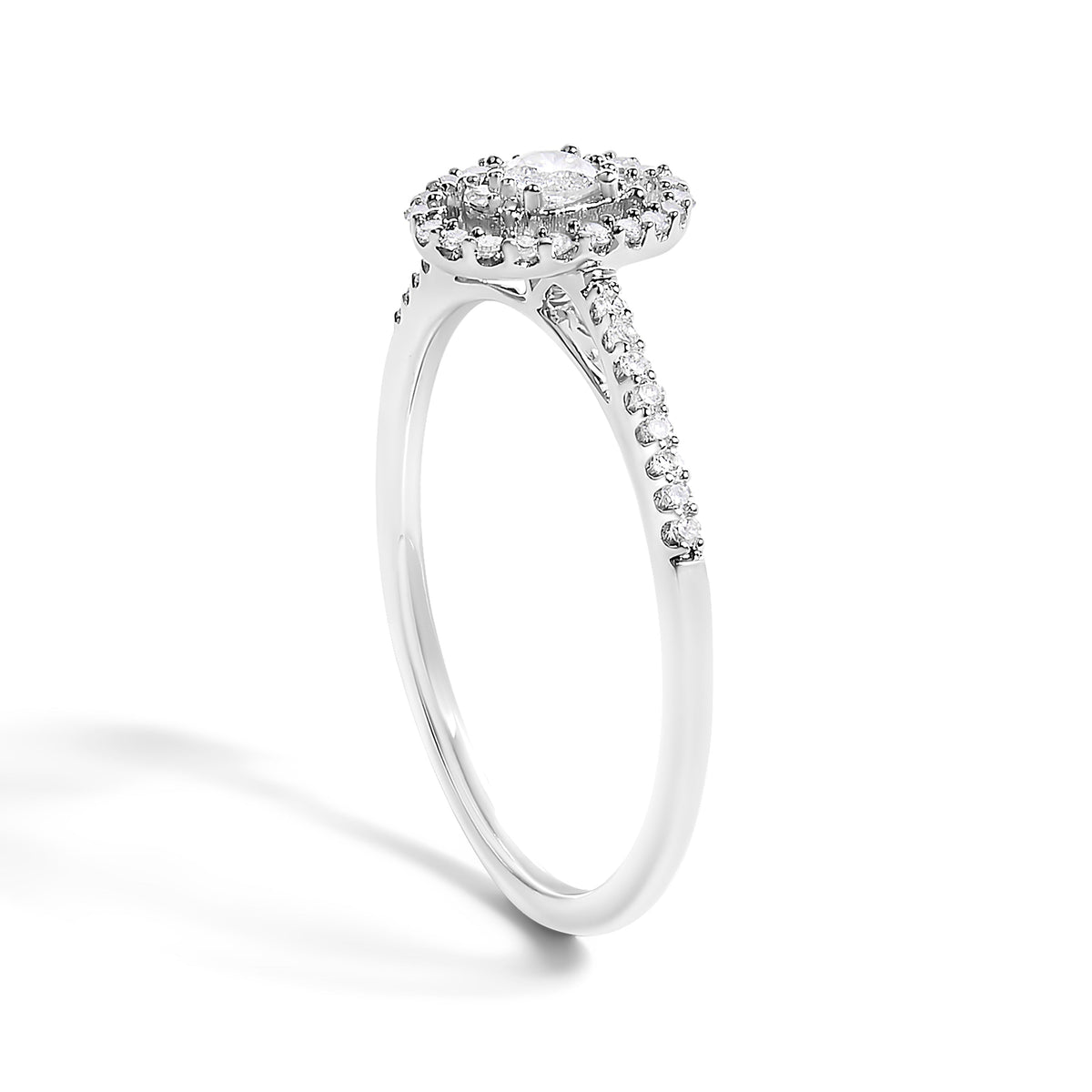 Oval halo diamond engagement ring in 14K white gold with pavé band, 0.20 ct tw, size 7 on Tampa Home & Garden Store