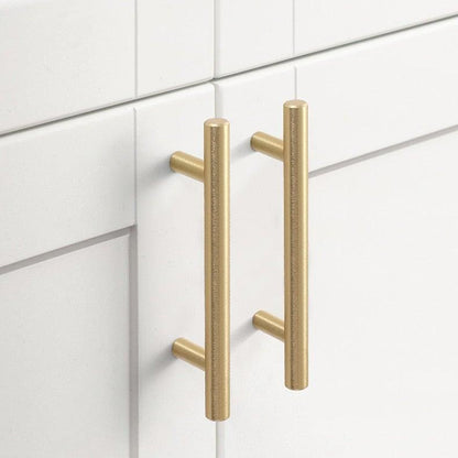 Brushed gold stainless steel T-bar cabinet handles, 2pcs, mounted on white cabinet doors on Tampa Home & Garden Store