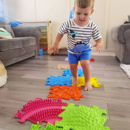 Rainbow Sensory Playmat Set with textured interlocking mats; child stepping across bright colors on Tampa Home & Garden Store