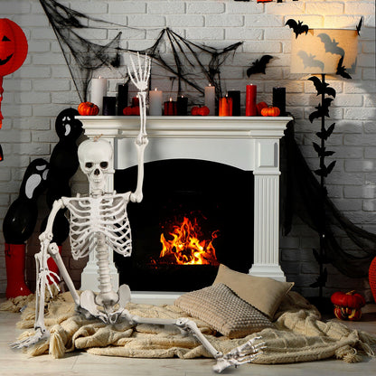 DirectDeals 5.4 ft Halloween skeleton cutout, white life-size prop beside a lit fireplace on Tampa Home & Garden Store