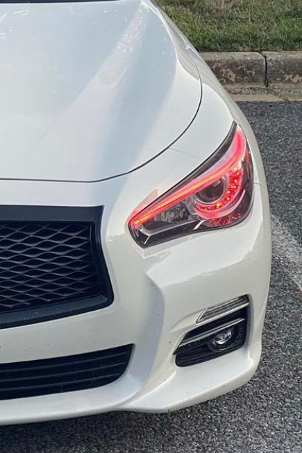 Infiniti Q50 RGBW Flow Series LED DRL boards on white car headlight assembly on Tampa Home & Garden Store