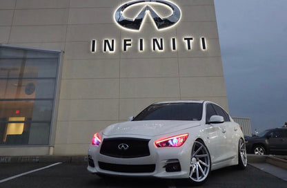 Infiniti Q50 RGBW Flow Series LED DRL boards on white Infiniti sedan at dealership on Tampa Home & Garden Store