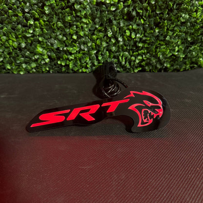 LED badge SRT Hellcat RGBW Flow; red logo on black plate with cable on Tampa Home & Garden Store