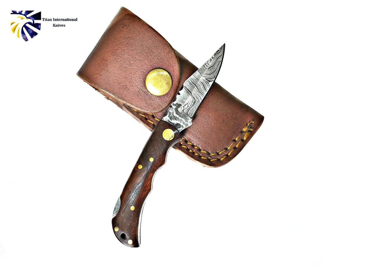 TF-003 Damascus knife by Titan International Knives with dark wood handle and brown leather sheath on Tampa Home & Garden Store