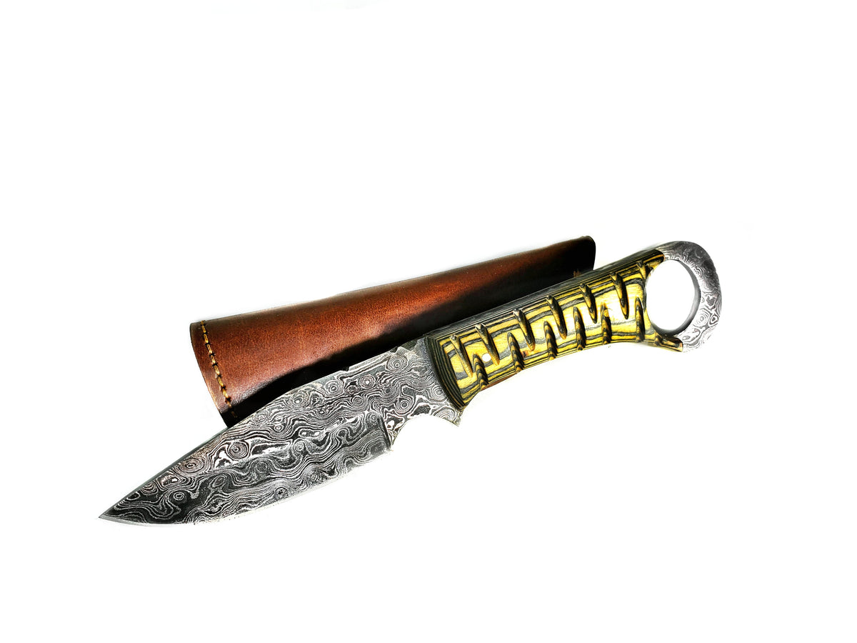 Damascus steel fixed blade knife with gold-toned handle accents and leather sheath on Tampa Home & Garden Store