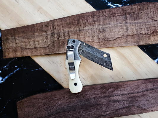 TF-007 folding knife with Damascus-pattern blade and ivory handle by Titan International K on Tampa Home & Garden Store